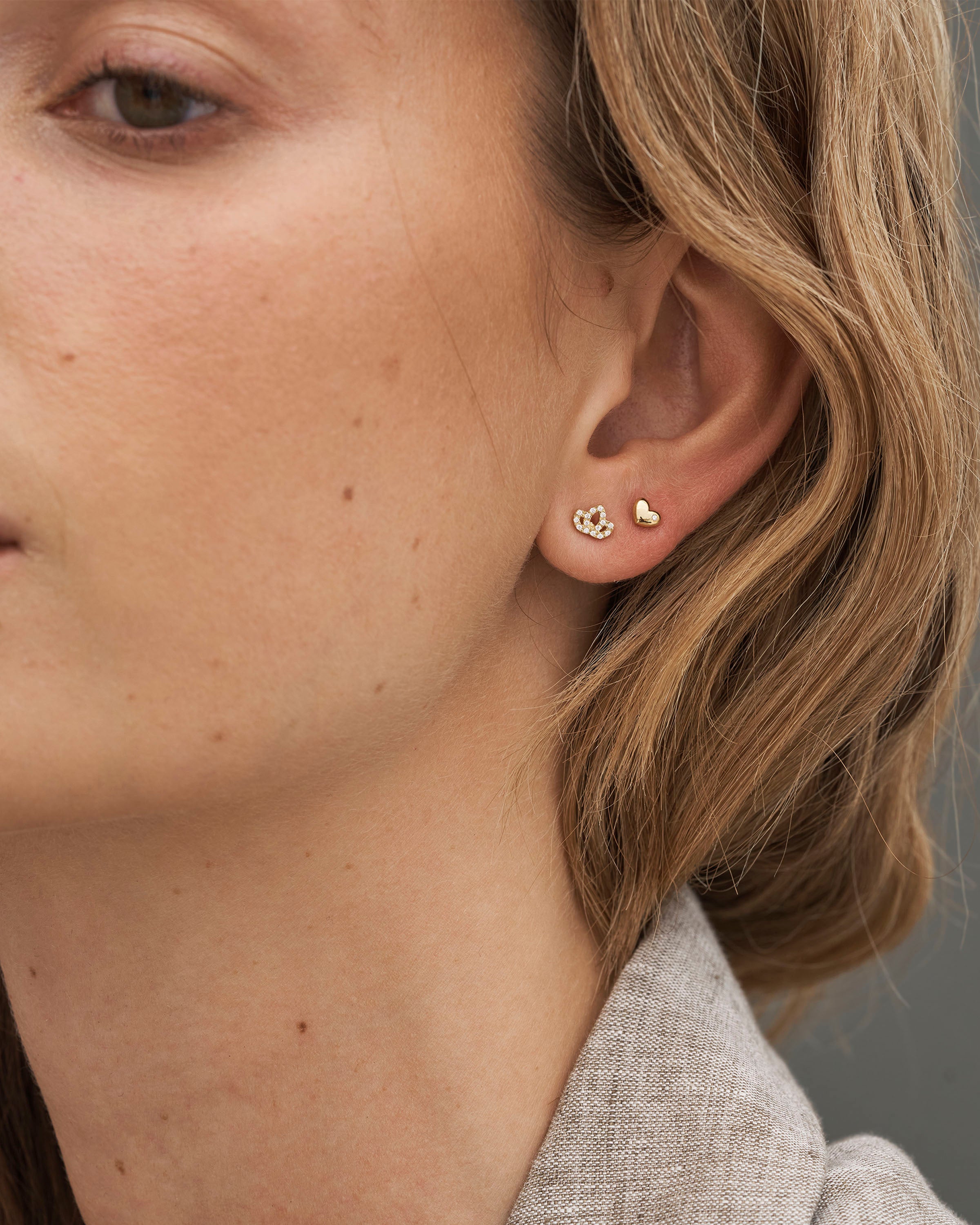 Symbols Lotus diamantøredobb - 18kt Gult Gull